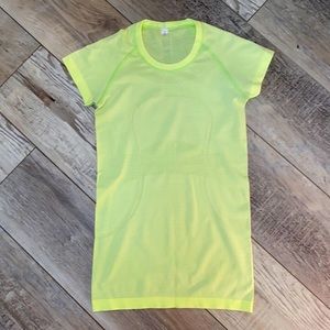 Lululemon bright lemon yellow short sleeve top.